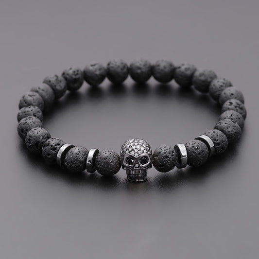 Pulsera de piedra volcanica con calavera