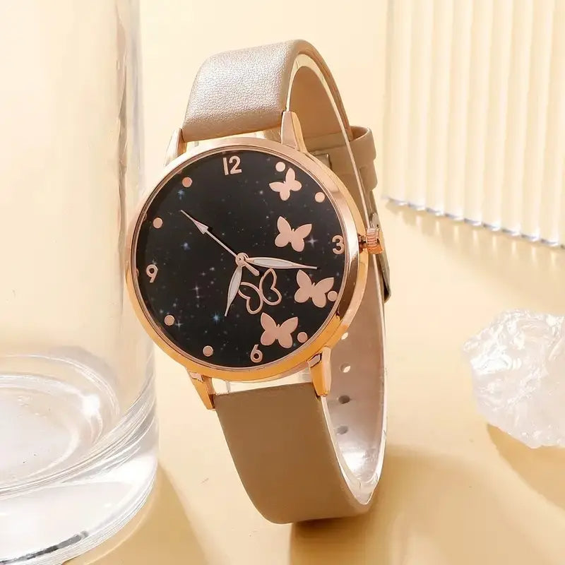 Reloj cuarzo con esfera de mariposa cielo estrellado informal de mujer - ShoppBolivia