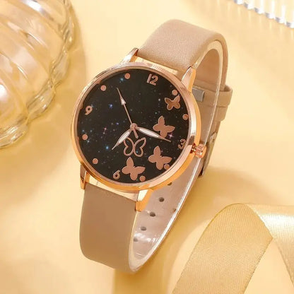 Reloj cuarzo con esfera de mariposa cielo estrellado informal de mujer - ShoppBolivia